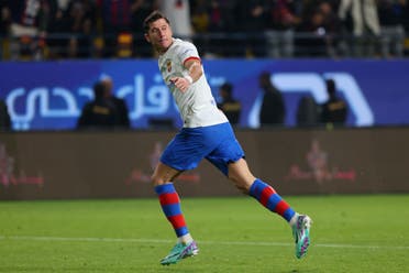 Barcelona’s Polish forward #09 Robert Lewandowski celebrates scoring his team’s first goal during the Spanish Super Cup semi-final football match between Barcelona and Osasuna at the al-Awwal Park Stadium in Riyadh, on January 11, 2024. (AFP)