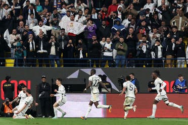 Real Madrid’s players celebrate their fourth goal during the Spanish Super Cup semi-final football match between Real Madrid and Atletico Madrid at the al-Awwal Park Stadium in Riyadh, on January 10, 2024. (AFP)