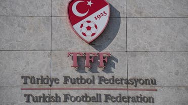 This picture taken on May 6, 2020 in Istanbul shows a logo of Turkish Football Federation (TFF) at the entrance of the organization's headquarters. (AFP)