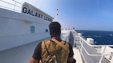 FILE PHOTO: A Houthi fighter stands on the Galaxy Leader cargo ship in the Red Sea in this photo released November 20, 2023. Houthi Military Media/Handout via REUTERS THIS IMAGE HAS BEEN SUPPLIED BY A THIRD PARTY//File Photo