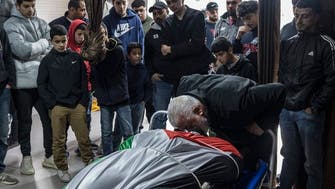 Palestinians mourn Palestinian-American teenager killed in West Bank