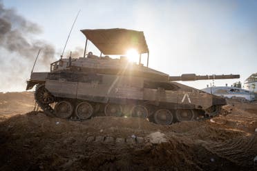 Israeli soldiers operate a tank in the Gaza Strip, amid the ongoing conflict between Israel and Hamas, in this handout picture released on January 20, 2024. (Reuters)