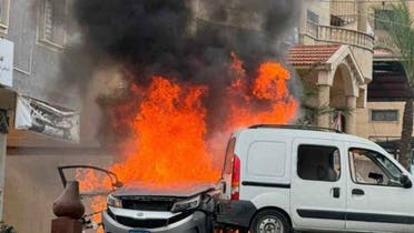 A car carrying Hezbollah fighters is on fire after being targeted by Israel. (X)