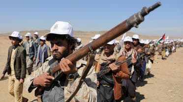 Tribesmen loyal to the Houthis march during a military parade for new tribal recruits amid escalating tensions with the US-led coalition in the Red Sea, in Bani Hushaish, Yemen, January 22, 2024. (Reuters)