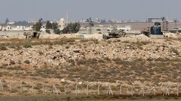 Vehicles near Nasib border crossing between Jordan and Syria, are seen from Marafaq, Jordan. (File photo: Reuters)