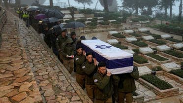 Israeli soldiers carry the flag-draped casket of reservist Elkana Vizel during his funeral at Mt. Herzl military cemetery in Jerusalem, Jan. 23, 2024. (AP)