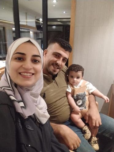Suha Nasser, her husband Mohammed and their child Ahmed.  (Supplied: EAA)