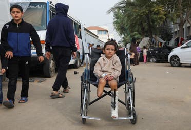 Palestinian girl Eman Al-Kholi, whose limb was amputated after being wounded in an Israeli strike that killed her parents, looks on as she sits in a wheelchair at the European Hospital, in Rafah in the southern Gaza Strip, December 28, 2023. ( File photo: Reuters)