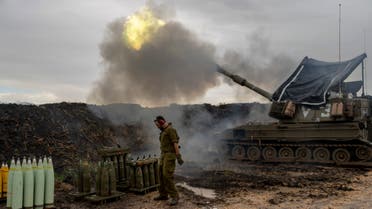 Israeli soldiers fire a mobile howitzer in the north of Israel, near the border with Lebanon, Monday, Jan. 15, 2024. AP Photo/Ohad Zwigenberg)