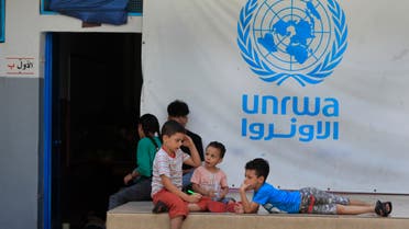 Palestinian children who fled with their parents from their houses in the Palestinian refugee camp of Ein el-Hilweh, gather in the backyard of an UNRWA (United Nations Relief and Works Agency for Palestine Refugees in the Near East) school, in the southern port city of Sidon, Lebanon, Tuesday, Sept. 12, 2023. (AP)