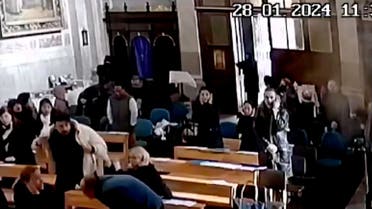 People react during a deadly attack by two masked gunmen at the Italian Santa Maria Catholic Church in Istanbul, Turkey January 28, 2024. (Reuters)