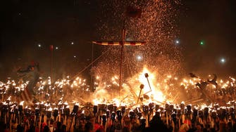 Up Helly Aa: Hundreds join Viking festival with axes, torches and a burning ship