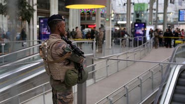 A French soldier of the Sentinelle security operation stands guard in a hall after a knife attack at Paris’s Gare de Lyon railway station, a major travel hub, on February 3, 2024. (AFP)