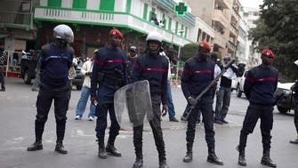 Senegal police fire tear gas at protest against postponement of presidential election