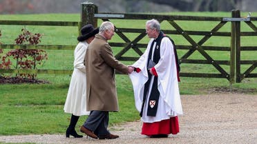 Britain’s King Charles and Reverend Canon Dr Paul Williams shake hands next to Queen Camilla as they arrive for a church service at St. Mary Magdalene’s church on the San-dringham estate in eastern England, Britain, on February 11, 2024. (Reuters)