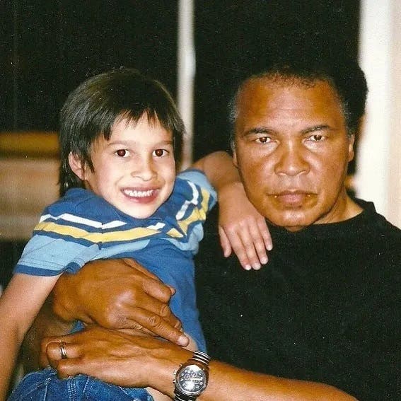 Legendary boxer Muhammad Ali with his grandson, Biaggio Walsh. (Supplied)