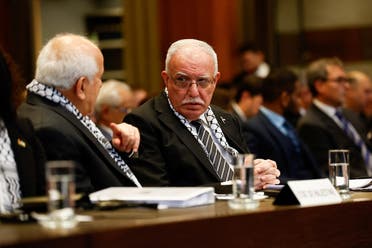 Palestinian Foreign Minister Riyad al-Maliki attends a public hearing held by The International Court of Justice (ICJ) to allow parties to give their views on the legal consequences of Israel's occupation of the Palestinian territories before eventually issuing a non-binding legal opinion in The Hague, Netherlands, February 19, 2024. (Reuters)