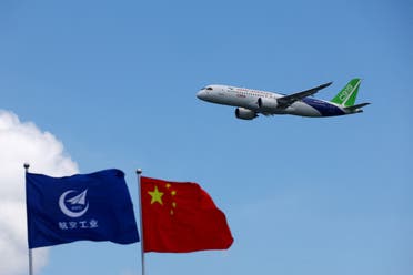 A Comac C919 flies during an aerial display at the Singapore Airshow at Changi Exhibition Centre, in Singapore, on February 20, 2024. (Reuters)