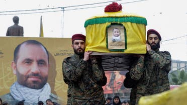 Hezbollah militants and supporters attend the funeral of one of the group’s commanders killed by an Israeli strike two days earlier, in Lebanon’s southern city of Nabatiyeh on Feb. 16, 2024. (AFP)