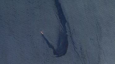 In this satellite image provided by Planet Labs, the Belize-flagged bulk carrier Rubymar is seen in the southern Red Sea near the Bay el-Mandeb Strait leaking oil after an attack by Yemen's Houthi rebels Tuesday, Feb. 20, 2024. Despite a month of U.S.-led airstrikes, Yemen's Iran-backed Houthi rebels remain capable of launching significant attacks. This week, they seriously damaged a ship in a crucial strait and apparently downed an American drone worth tens of millions of dollars. (Planet Labs PBC via AP)