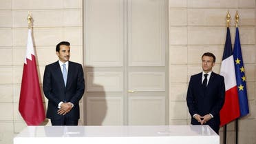 French President Emmanuel Macron and Qatari Emir Sheikh Tamim bin Hamad Al Thani attend an agreement signing ceremony at the Elysee Palace during his state visit in Paris, France, February 27, 2024. (Reuters)