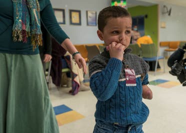 Four-year-old Omar Abu Kuwaik, from Gaza, stands in a waiting room at Shriners Children's Hospital, Thursday, Jan. 18, 2024, in Philadelphia. (AP)
