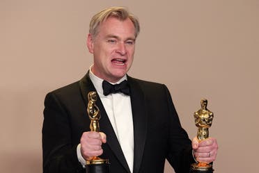 Christopher Nolan poses with the Oscar for Best Picture and Best Director Oscar for “Oppenheimer,” in the Oscars photo room at the 96th Academy Awards in Hollywood, Los An-geles, California, US, on March 10, 2024. (Reuters)