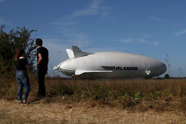 The Airlander 10 hybrid airship is seen after it recently left the hangar to commence ground systems tests before its maiden flight, at Cardington Airfield in Britain. (Reuters)
