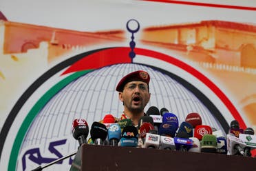 Yahya Sarea, the Houthi military spokesperson, delivers a statement, during a pro-Palestinian rally, saying they launched an attack on the Pacific 01 ship in the Red Sea with missiles, in Sanaa, Yemen, March 15, 2024. (Reuters)