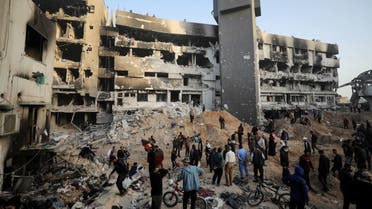 Palestinians inspect damages at Al Shifa Hospital after Israeli forces withdrew from the hospital and the area around it following a two-week operation, amid the ongoing conflict between Israel and Hamas, in Gaza City April 1, 2024. (File photo: Reuters)