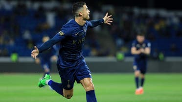 Al Nassr’s Cristiano Ronaldo celebrates scoring the fourth goal to complete his hat-trick during a match against Abha on April 2, 2024. (Reuters)
