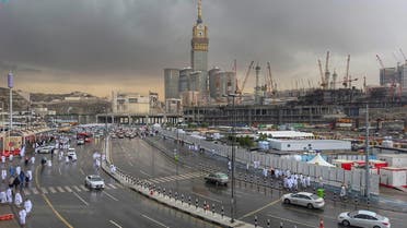 A general view of the holy city of Mecca showing Muslims walking towards the Grand Mosque, in heavy rain during the holy month of Ramadan, in Mecca, Saudi Arabia, April 10, 2023. (Saudi Press Agency/Handout via Reuters)