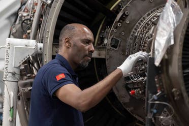 A worker repairs aircraft parts inside Safran Aircraft Engines repair plant outside of Casablanca, Morocco, Thursday, April 18, 2024. (AP)