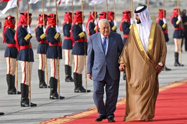 This handout picture shows Palestinian President Mahmoud Abbas (L) being received in Bahrain’s capital Manama on May 15, 2024 ahead of the 33rd Arab League Summit. (Via AFP)