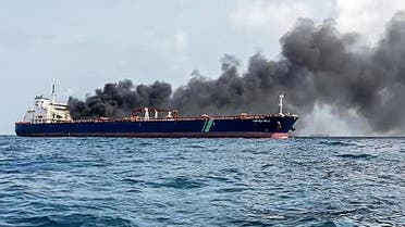 A handout photo taken and released by Malaysian Maritime Enforcement Agency on July 19, 2024 shows the Singapore-flagged tanker Hafnia Nile on fire in Tanjung Sedili, near Singapore. (AFP)