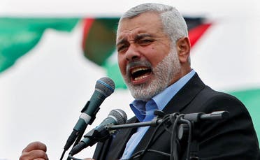 Ismail Haniyeh, primer ministro del gobierno de Hamás en Gaza, habla con sus partidarios durante una manifestación de Hamás en conmemoración del aniversario de la muerte de sus líderes asesinados por Israel, en la ciudad de Gaza el 23 de marzo de 2014.