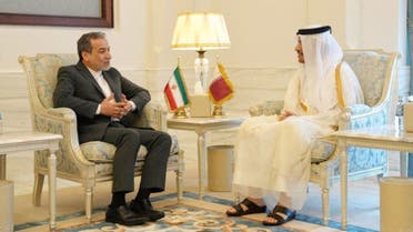 This handout picture provided by the Iranian foreign ministry on October 10, 2024, shows Qatar’s Prime Minister and Minister of Foreign Affairs Sheikh Mohammed bin Abdulrahman bin Jassim al-Thani (R) meeting with Iran’s Foreign Minister Abbas Araghchi in Doha on October 10, 2024. (Via AFP)