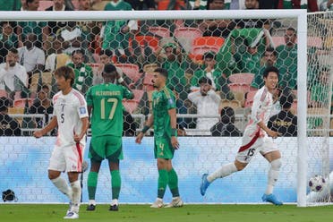 Japan's forward #15 Daichi Kamada celebrates after scoring his team's first goal during the 2026 FIFA World Cup Asian qualification football match between Saudi Arabia and Japan at King Abdullah Sports City in Jeddah on October 10, 2024. (AFP)