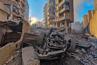 Wreckage of a vehicle lies at a site damaged in the aftermath of Israeli strikes on Beirut’s southern suburbs, amid the ongoing hostilities between Hezbollah and Israeli forces, Lebanon, on October 24, 2024. (Reuters)