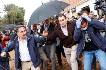 People throw mud at Spain's King Felipe, following heavy rains that caused floods, as he visits Paiporta, near Valencia, Spain, November 3, 2024. (Spain)