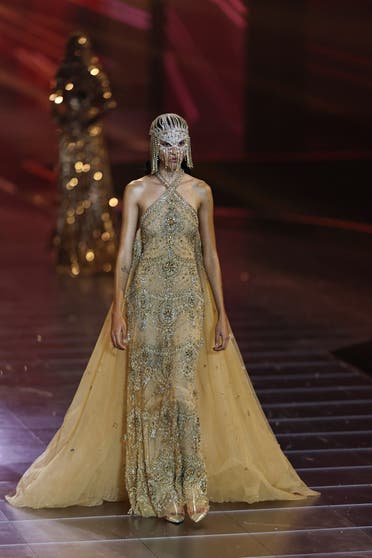 A model displays the latest collection of Lebanese fashion designer, Elie Saab, during the The 1001 Seasons of Elie Saab fashion show celebrating the fashion designer's 45-year fashion career, as part of Riyadh Season in Riyadh, Saudi Arabia, November 13, 2024. (Reuters)