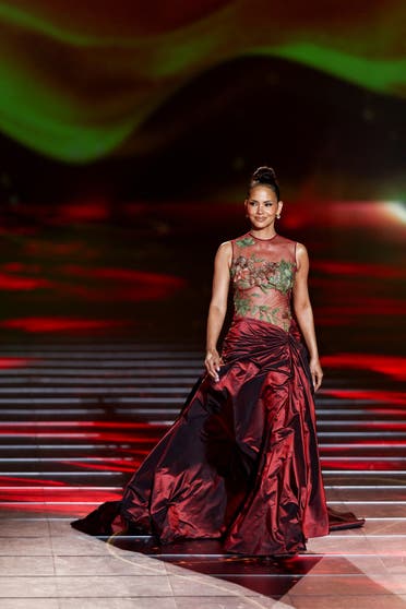 Actor Halle Berry presents a creation from the collection of Lebanese fashion designer Elie Saab during the 'The 1001 Season of ELIE SAAB' fashion show celebrating the fashion designer Saab's 45-year fashion career, as part of Riyadh Season in Riyadh, Saudi Arabia, November 13, 2024. (Reuters)