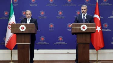 Turkish Foreign Minister Hakan Fidan (R) and Iranian Foreign Minister Abbas Araghchi (L) hold a joint press conference after their meeting in Ankara on December 2, 2024. (AFP)