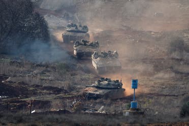 Israeli tanks return from southern Lebanon, following the ceasefire between Israel and Iran-backed group Hezbollah, as seen from northern Israel, December 4, 2024. (Reuters)