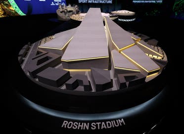 A model of the proposed Roshn Stadium is seen inside the Saudi Arabia World Cup bid exhibition. (Reuters)