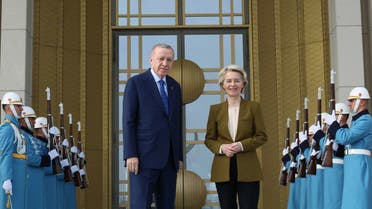 This handout photograph taken and released by the Turkish presidential press service on December 17, 2024, shows European Commission President Ursula von der Leyen (R) posing with Turkish President Recep Tayyip Erdogan at the Presidential Palace in Ankara. (AFP)