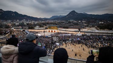 Rival camps protest as South Korea president resists arrest