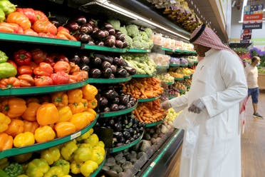 A Saudi man buys vegetables at a supermarket, in Riyadh, Saudi Arabia May 11, 2020. (File photo: Reuters)