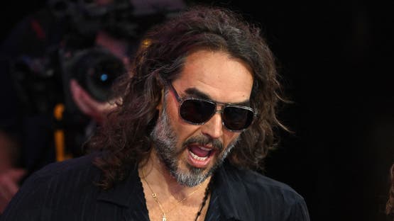 MILWAUKEE, WISCONSIN - JULY 18: Comedian and actor Russell Brand attends the fourth day of the Republican National Convention at the Fiserv Forum on July 18, 2024 in Milwaukee, Wisconsin. Delegates, politicians, and the Republican faithful are in Milwaukee for the annual convention, concluding with former President Donald Trump accepting his party's presidential nomination. The RNC takes place from July 15-18. Leon Neal/Getty Images/AFP (Photo by LEON NEAL / GETTY IMAGES NORTH AMERICA / Getty Images via AFP)