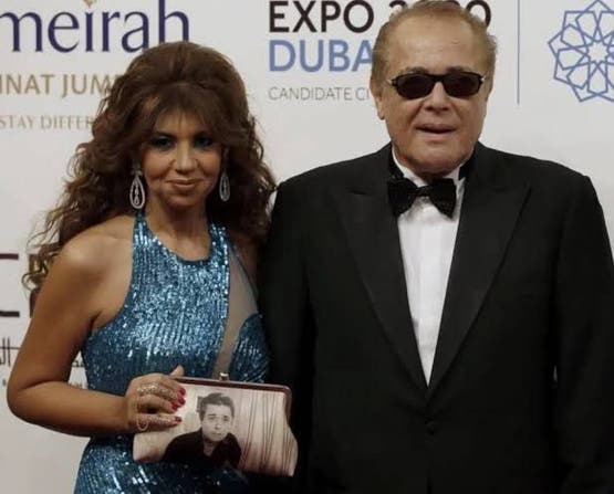 الفنان محمود عبد العزيز وزوجته الإعلامية بوسي شلبي 